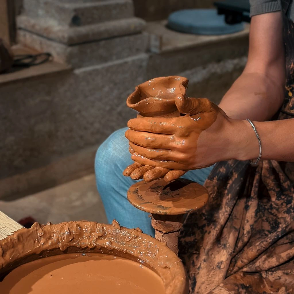 A ceramicist at work in a Lyme Regis studio